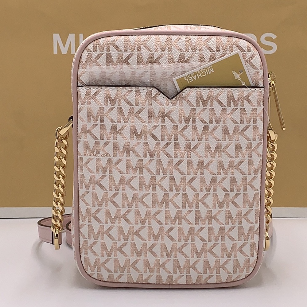 MICHAEL KORS
Jet Set Travel Md Signature Logo Crossbody
OPTIC WHITE/RS GOLD
NWT - Picture 7 of 16